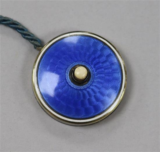 An early 20th century 935 white metal and guilloche enamel bell push, with chord, 35mm.